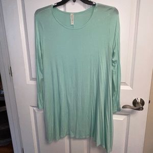 Teal long sleeve shirt. Round neck.
